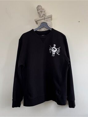 Vintage Y2K Stussy Black Crewneck Sweater with White Skull Graphic